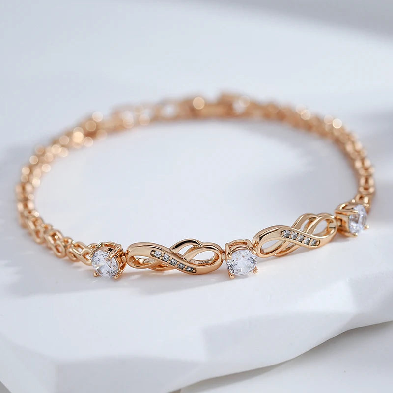 Pulseira de Símbolos do Infinito com Zircônias Naturais e Acabamento em Ouro Rosé 14K