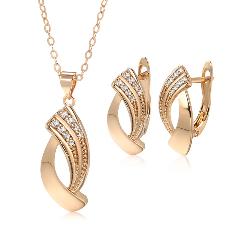 Conjunto de Brincos e Colar Geométrico Elegante com Curvas Delicadas e Zircônias Cravejadas, Acabamento em Ouro Rosé 14K