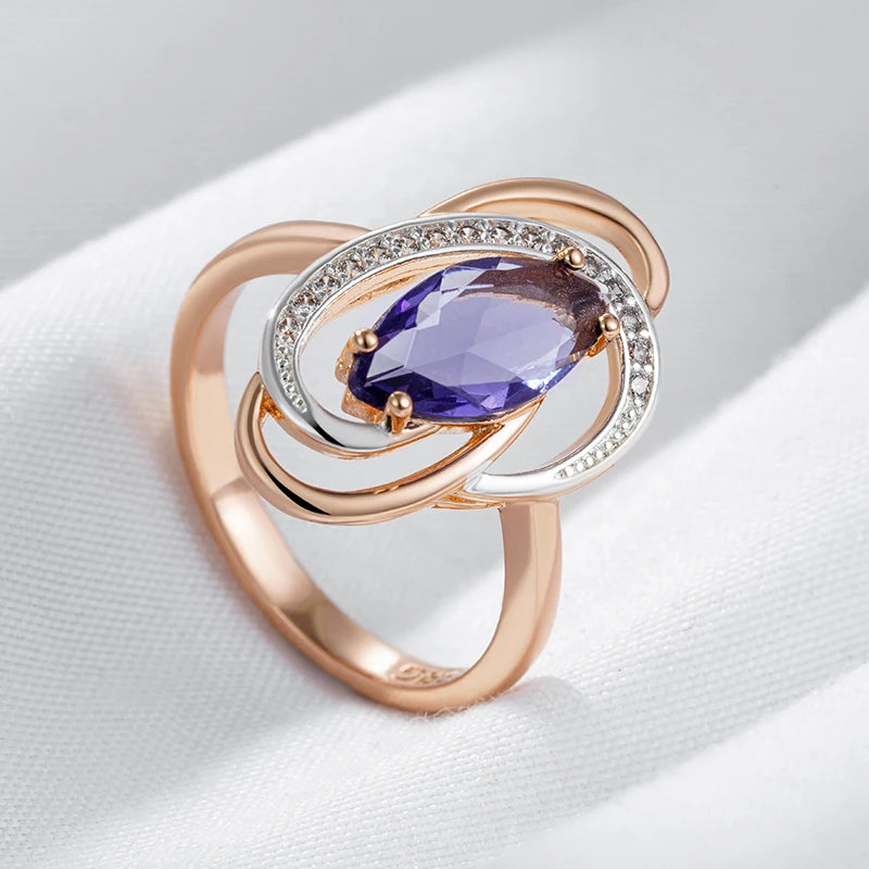 Anel Imponente Oval com Linhas Circulares, Acabamento em Ouro Rosé 14K e Zircônia Roxa Central