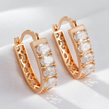 Par de Brincos de Argola Oval com Zircônias e Acabamento em Ouro Rosé 14K