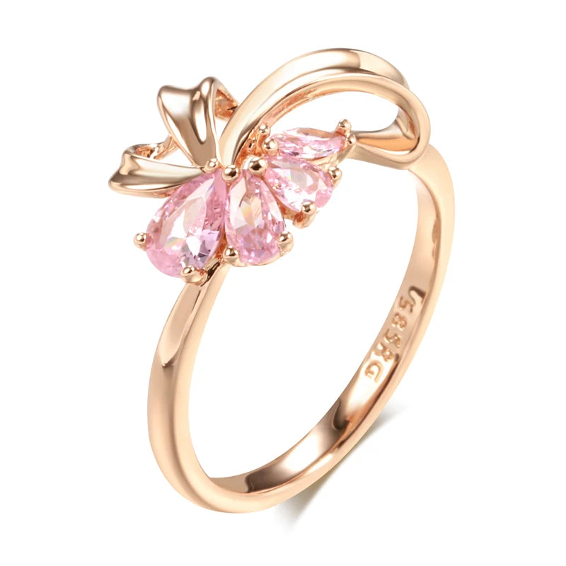 Anel Elegante com Design de Linhas Curvas e Zircônias em Rosa Choque, Acabamento em Ouro Rosé 14K