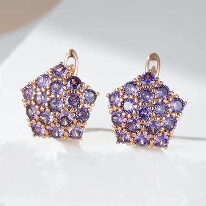 Par de Brincos Estilo Estrela Cravejados de Zircônias Roxas com Acabamento em Ouro Rosé 14K